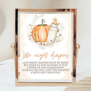 May include: A printable sign with a watercolor illustration of a pumpkin and a baby bottle. The sign says "Late night diapers" and includes the text "Late night diapers must be done! But here's a way to make it fun! A word of encouragement, a giggle or two, give the parents a note just from you!"