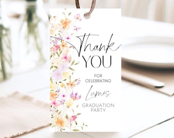 May include: Thank you for celebrating [Name]'s graduation party. White card with black text and floral border.