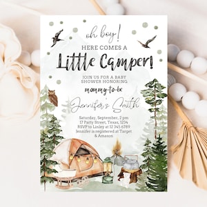May include: A baby shower invitation with a woodland theme. The invitation features a watercolour illustration of a tent, a campfire, and a forest. The text on the invitation reads "oh boy! Here comes a Little Camper!" and includes the name "Jennifer's Smith".