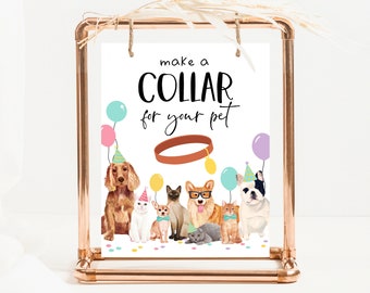 May include: A white sign with the text "Make a Collar for your pet" in black. The sign is decorated with a brown collar, colorful balloons, and a group of dogs and cats wearing party hats.