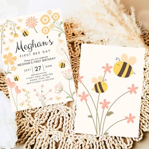 May include: A printable invitation for a first birthday party with a bee theme. The invitation features a yellow and black bee, pink and yellow flowers, and the text "Meghan's First Bee Day".