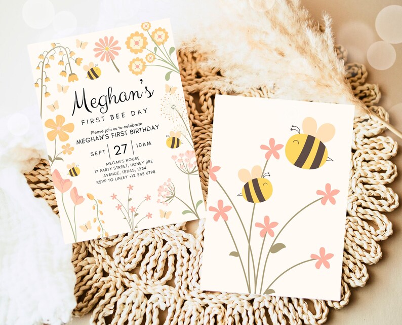 May include: A printable invitation for a first birthday party with a bee theme. The invitation features a yellow and black bee, pink and yellow flowers, and the text "Meghan's First Bee Day".