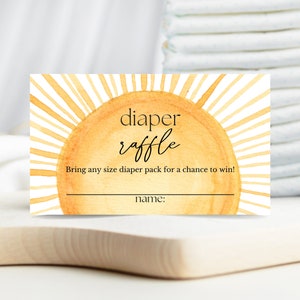Könnte beinhalten: Eine gelbe und weiße Sonnengrafik mit dem Text "diaper raffle" und dem Text "Bring any size diaper pack for a chance to win!" Der Text "name:" befindet sich unter der Grafik.