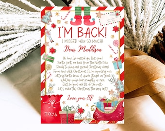 May include: A red and white Christmas elf letter with gold glitter accents. The letter says "I'm Back! I missed you so much!" and is addressed to "Dear Maddison". The letter includes a message from the elf about being back from the North Pole and reporting back to Santa about Maddison's behaviour.
