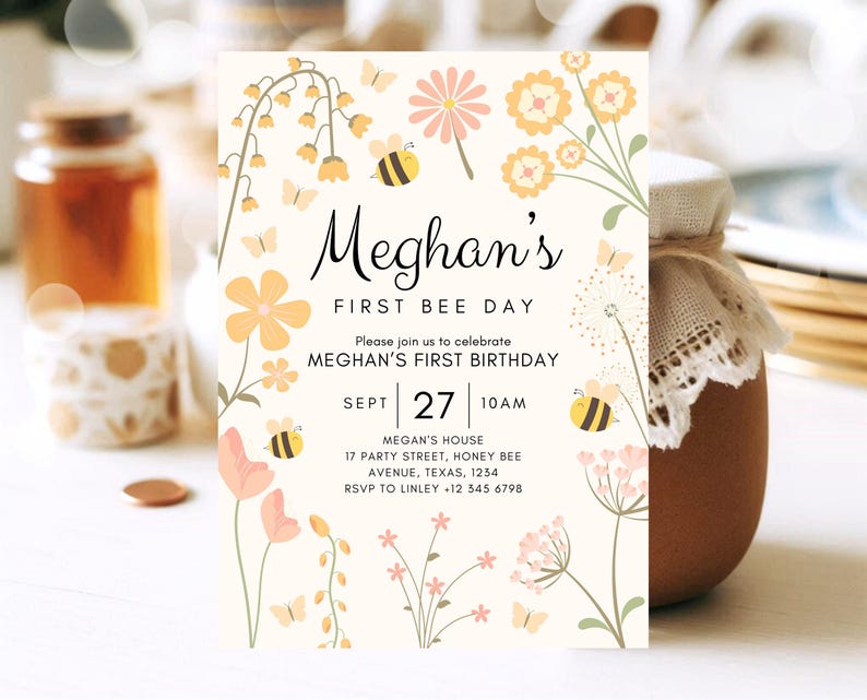 May include: A yellow and white bee-themed first birthday invitation with a floral design. The invitation says "Meghan's First Bee Day" and includes the date "Sept 27" and time "10 AM".