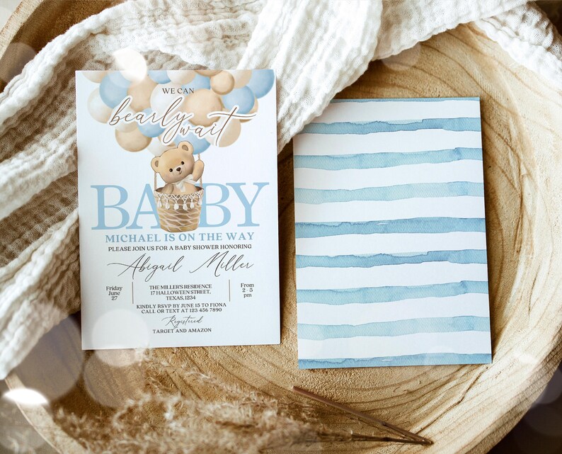 May include: A baby shower invitation with a blue and white striped background. The invitation features a cartoon teddy bear in a hot air balloon with the text "We can barely wait Baby Michael is on the way".