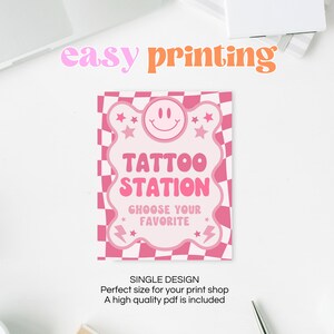 May include: Pink and white printable sign with a checkered background. The sign says "Tattoo Station" with a smiley face and stars. The text also says "Choose your favorite".