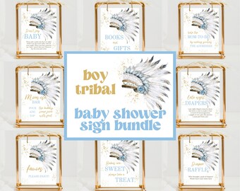 May include: A collection of baby shower signs in gold frames. Each sign features a Native American headdress design with blue and gold accents. Text includes "Don't say BABY", "Books and Gifts", and "Mom-osa Bar".