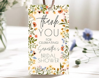 May include: Thank you for celebrating Samantha's bridal shower. A white card with a floral border and black text.