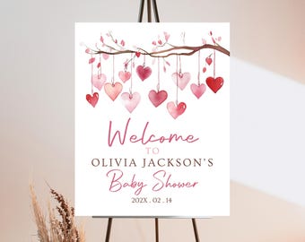 May include: Welcome to Olivia Jackson's Baby Shower sign with a watercolor illustration of a branch with pink and red hearts hanging from it. The date of the event is 202X. 02. 14.