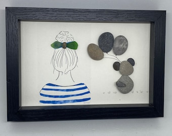 Pebble painting/ the girl is her dog/ beach pebbles and recycled glasses