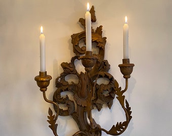 Italian sconce carved in wood with 3 arms.