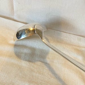 Christofle Silver plated ladle. 12 3/4 inches. French silversmith. No monogram