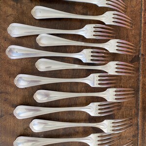 12 Christofle Silver Plated Forks. Spatours style. 1970s 8.5 inches
