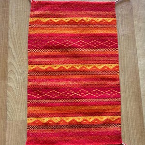 Oaxacan rug 15”W X 24”L  mountains and rain, handwoven in Oaxaca by Zapotec artisans.