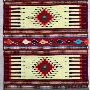 Authentic handwoven rug from Oaxaca, México. 24in X 39.5in with a zapotec design known as maguey.