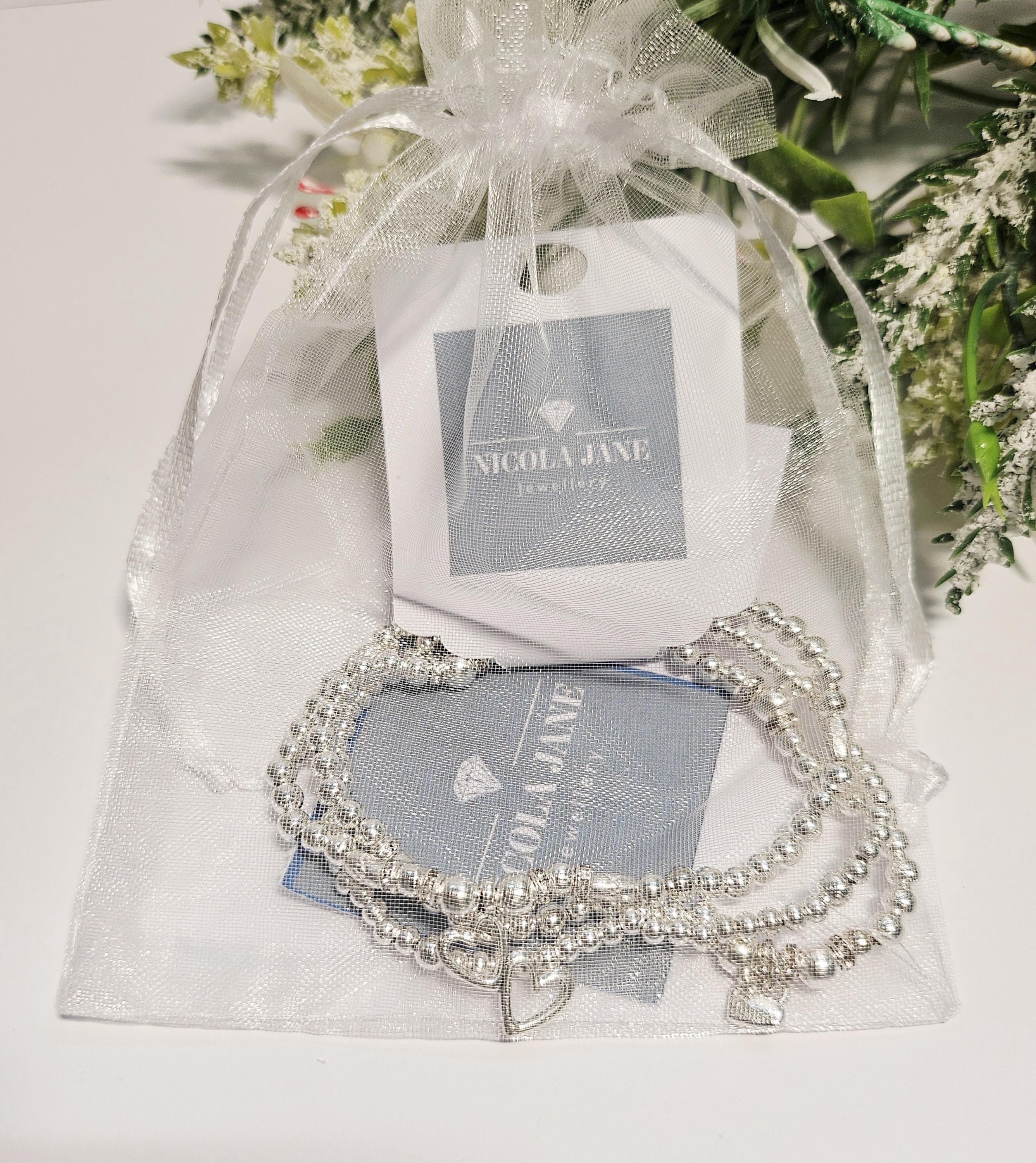 Braccialetto di perle personalizzato: ciondolo a forma di cuore inciso, regalo per la mamma - Italia