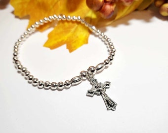 Silver Beaded Boho Style Stretch Bracelet With Jesus Crucifix Cross Charm.