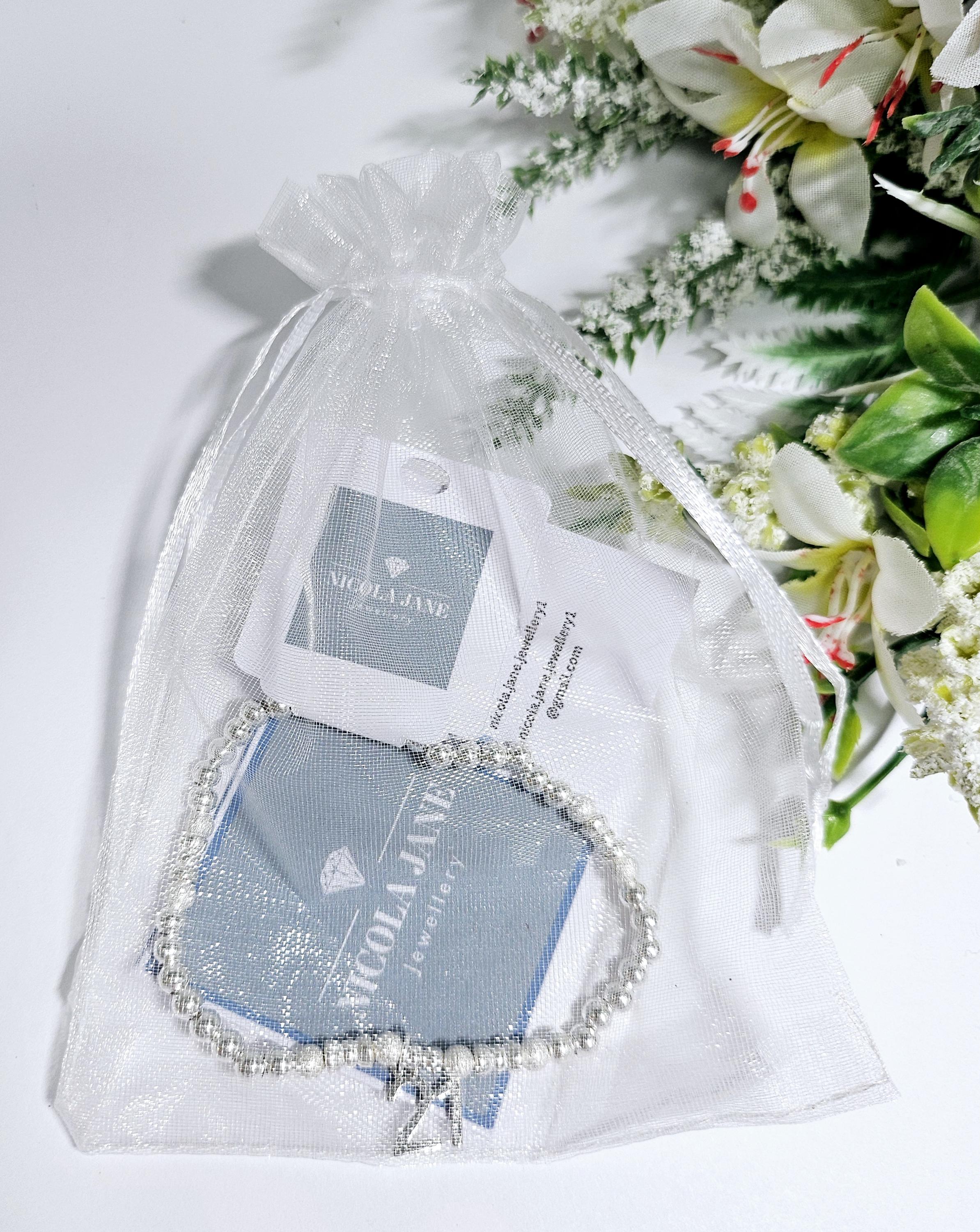 Lu Bella - Bracciale da donna con ciondolo e sacchetto regalo
