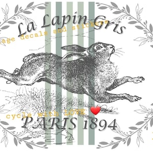 May include: A vintage illustration of a rabbit running with the text "La Lapin Gris vintage decals and stickers up cycle with love PARIS 1894 FIVE" in gold and grey lettering.
