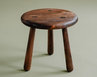 Milking stool, small wooden stool in a rustic style, reddish brown, solid pine, handcrafted stool