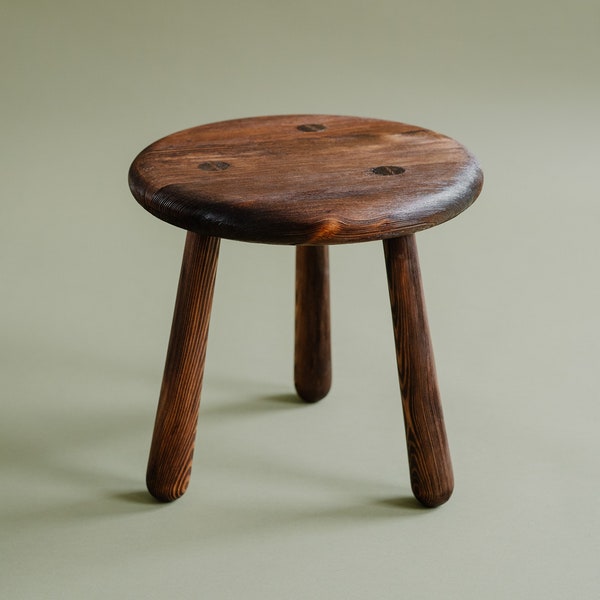 Milking stool, small wooden stool in a rustic style, reddish brown, solid pine, handcrafted stool