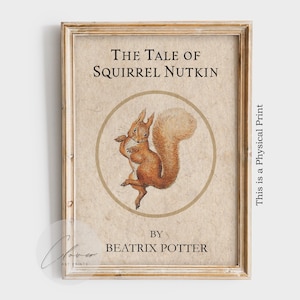 May include: Framed print of "The Tale of Squirrel Nutkin" by Beatrix Potter. The artwork features a watercolor illustration of a squirrel inside a circular frame. The print has a vintage aesthetic with a light brown background and a wooden frame.