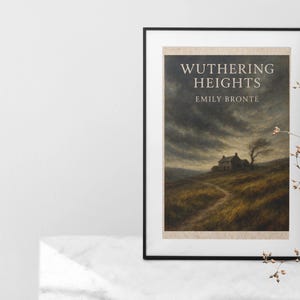 May include: A framed print of "Wuthering Heights" by Emily Bront&euml;. The artwork depicts a landscape with a house, a winding path, and a dramatic sky. The frame is black, and the print is displayed on a white surface.