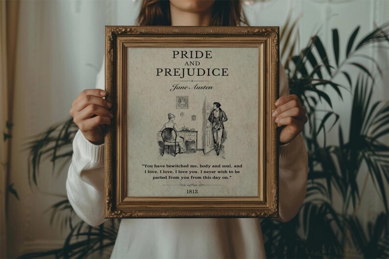 May include: A framed print of the book cover for Pride and Prejudice by Jane Austen. The cover features a black and white illustration of two people in a room. The quote "You have bewitched me, body and soul, and I love, I love, I love you. I never wish to be parted from you from this day on." is printed below the illustration. The year 1813 is printed at the bottom of the print.