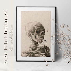 May include: Black framed print showing a grayscale illustration of a skeleton smoking a cigarette. The artwork has a vintage aesthetic. Text on the left side of the frame reads "Free Print Included" and "Clover Art Prints".