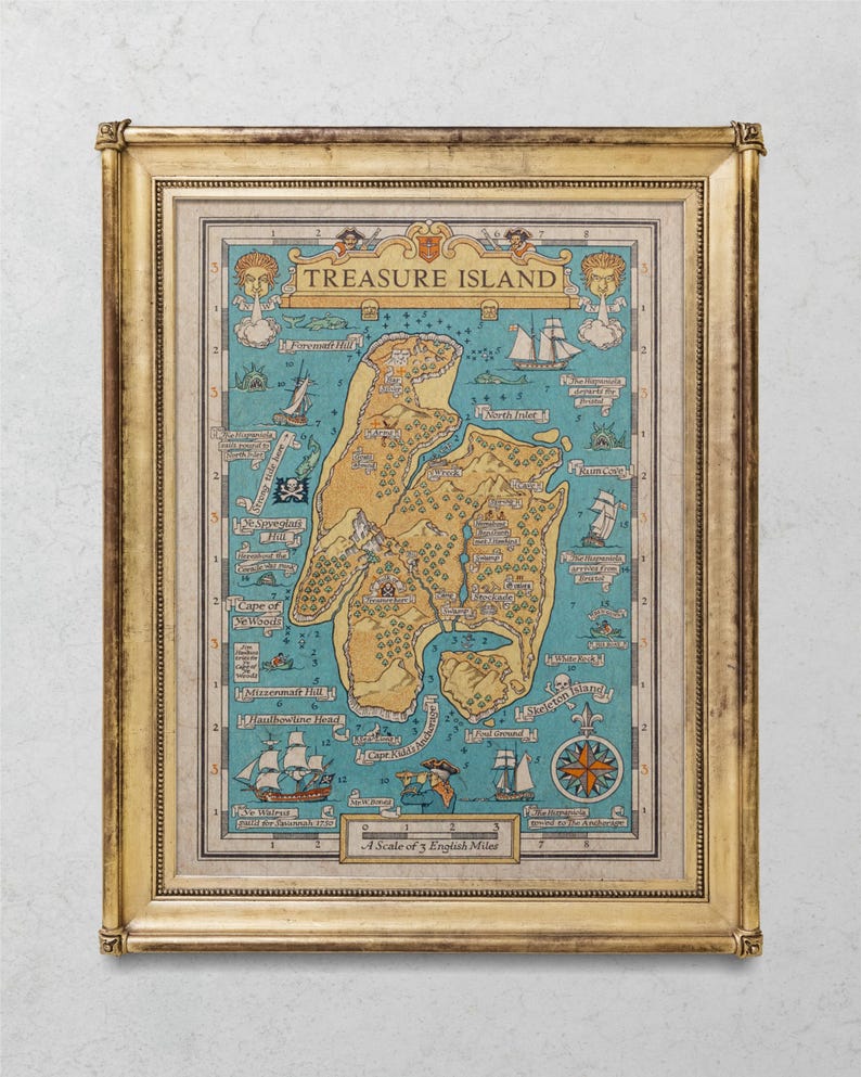 May include: A vintage-style map of Treasure Island, framed in a gold frame. The map features a detailed illustration of the island, including landmarks like Skull Island, North Inlet, and the Captain's Cabin. The map is surrounded by a decorative border and includes a compass rose and a scale.