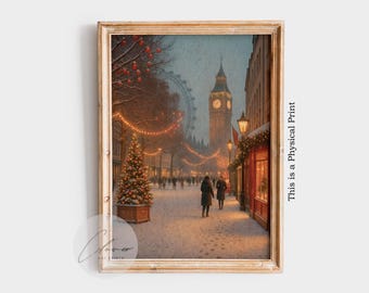 May include: A framed print of a snowy London street scene at Christmas. The artwork features a decorated Christmas tree, Big Ben, and the London Eye. The image is in a wooden frame and has the text "This is a Physical Print".