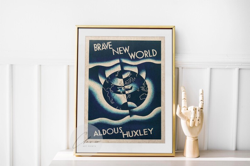 May include: A framed art print with the words "Brave New World" and "Aldous Huxley" in white on a dark blue background. The artwork features a stylized globe design. The frame is gold-coloured.