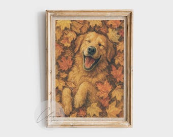 May include: A framed print of a Golden Retriever dog lying in a pile of autumn leaves. The dog is smiling with its mouth open. The leaves are shades of yellow, orange, and red. The frame is a light brown color.