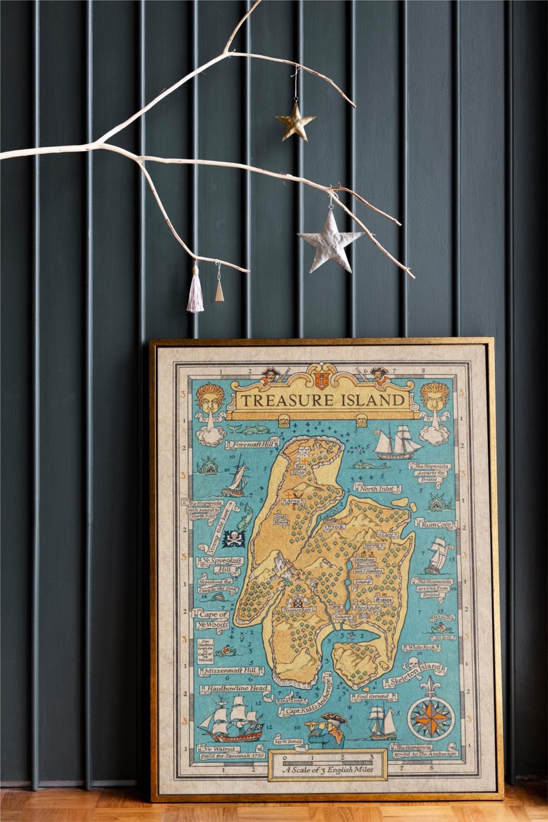 May include: A vintage-style map of Treasure Island, featuring a detailed illustration of the island with various landmarks and locations. The map is printed on a cream-colored paper with a gold frame.