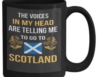 May include: Black coffee mug with a white and blue Scottish flag and the text "The voices in my head are telling me to go to Scotland".