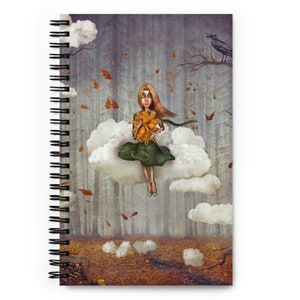 May include: A girl with long brown hair sits on a cloud holding a yellow flower in a woodland setting. The woodland is filled with fallen leaves and there is a crow perched on a branch in the background.