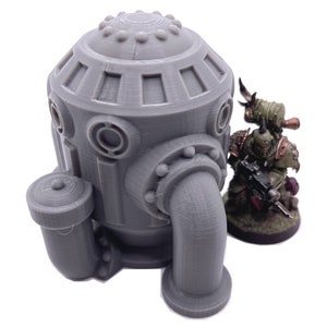 May include: A gray 3D printed model of a futuristic industrial pipe system with a round top and multiple pipes. The model is about the size of a miniature figure.
