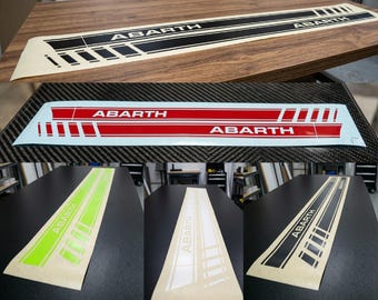 Strisce Racing compatibili con Fiat 500 ABARTH Restyling: adesivi stile Abarth in vinile di alta qualità con canali aria anti-bolle.