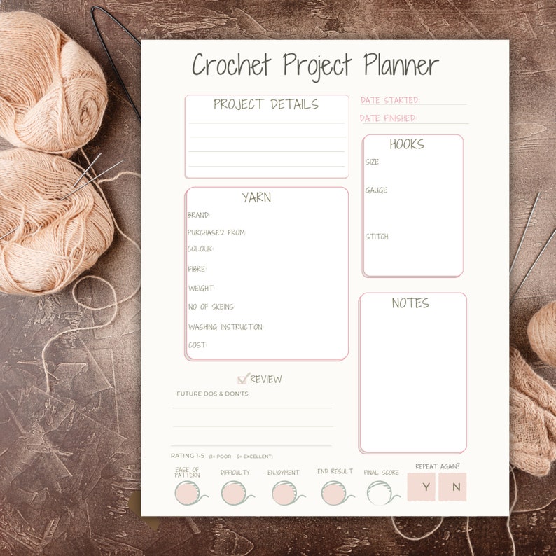 May include: A printable crochet project planner with sections for project details, yarn information, hooks, notes, and a review section. The planner includes a rating system for ease of pattern, difficulty, enjoyment, end result, and final score.