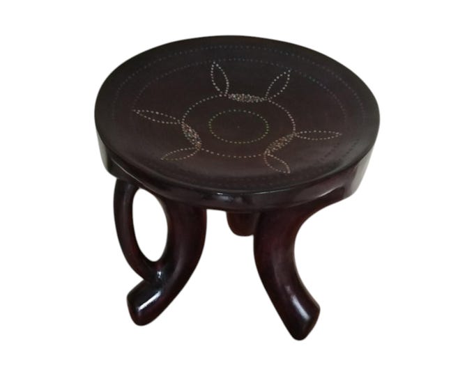 Hand-Carved African Wooden Accent Stool, Dark Wood Tribal Inlay Decor, Rustic Small Side Table, Three-Legged Ethnic Furniture Gift