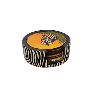 May include: A set of four coasters with a holder. Each coaster features a zebra design on a yellow and green background. The holder and the sides of the coasters have a black and white zebra stripe pattern.