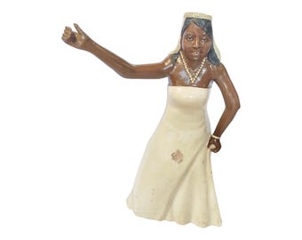 Handcrafted Woman Figurine in Traditional Dress: Cultural Art Decor