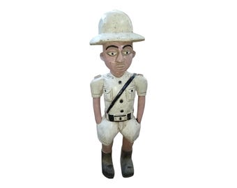 Hand-Carved Wooden Police Officer Figurine: Colonial Era African Art