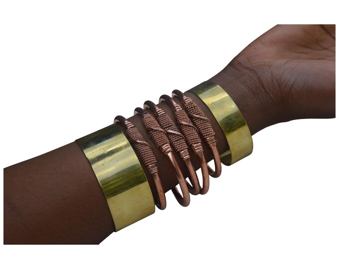 On sale A Group of seven Bold Brass & Copper Cuff Bracelet Set - Handcrafted African Inspired Statement Jewelry