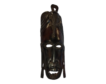 Hand-Carved African Wooden Mask: Stylized Cultural Art Decor