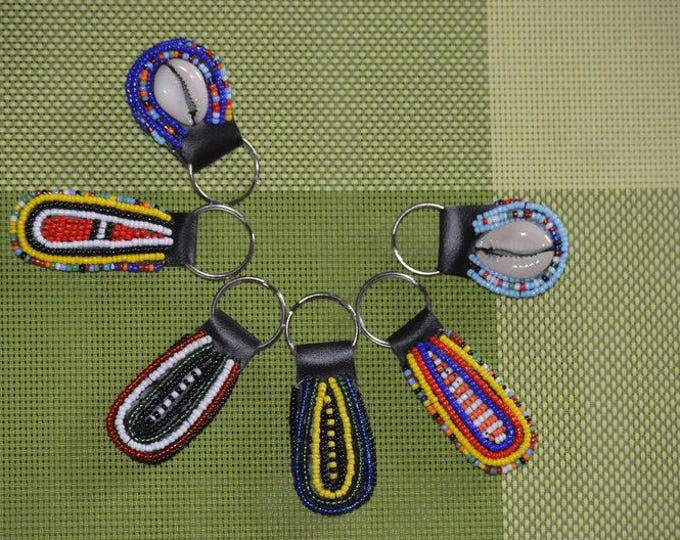 Handcrafted African Beaded Keychains: Cowrie Shell Tribal Design - Set of 2