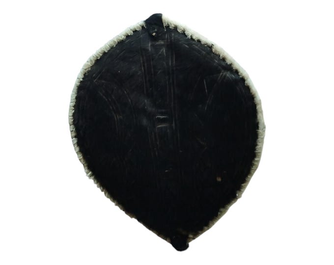 An Enigmatic Black African Masai Shield Subtle Tribal Art Wall Decor Warrior Shield Kenya Mysterious Dark Collectible