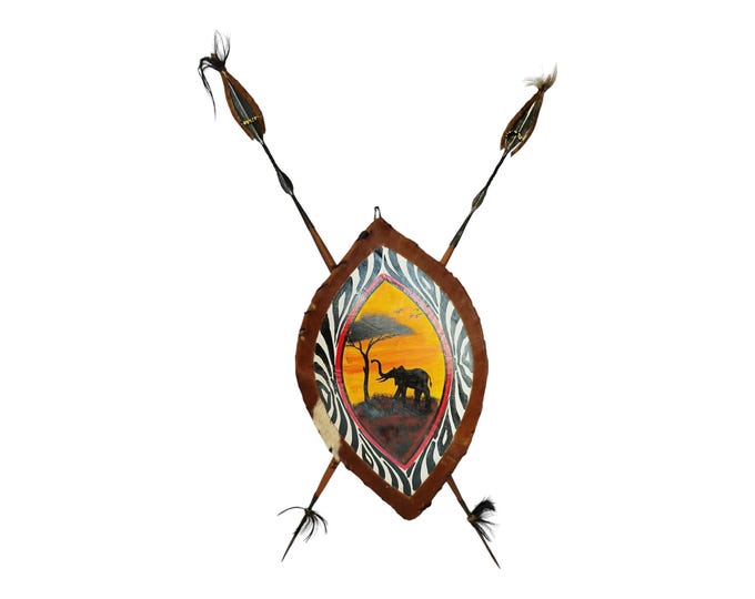 Defend by Day, Adorn by Night: Maasai Spear & Sunset Elephant Shield 2 maasai Spears and sunset shield Easy to dismantle easy carry Brown