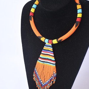 On SALE African  Striking Orange Beaded Necklace with Vibrant Multi-Colored Pendant - Handcrafted Art | Zulu Choker | Stylish | Gift Her |
